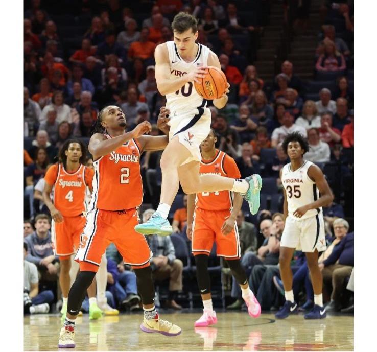 Virginia Cavaliers guard Taine Murray (10) saves the ball from a back court violation against the Syracuse Orange at John Paul Jones Arena.